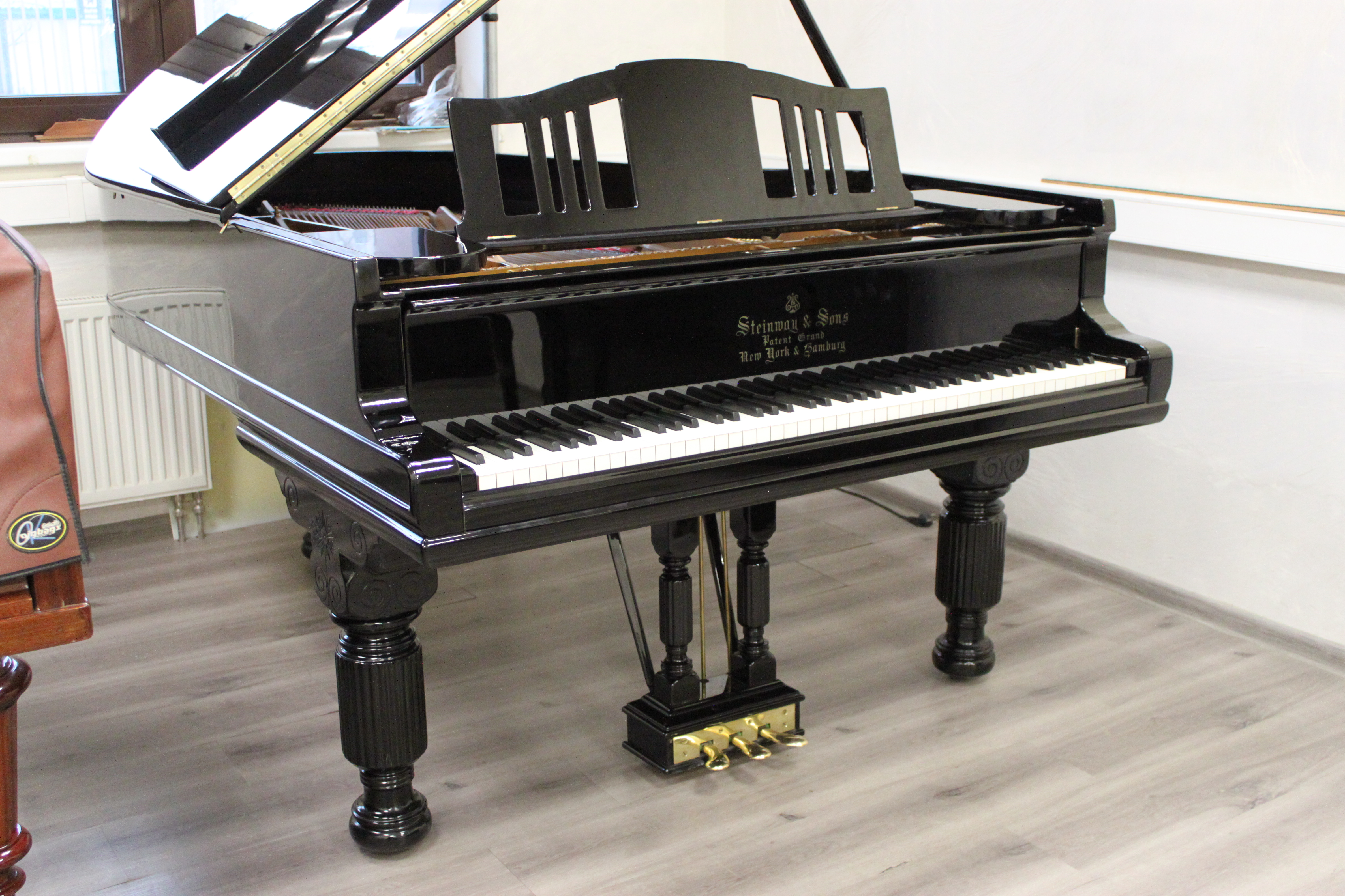 Черный рояль Стейнвей Steinway цена 6 000 000руб.